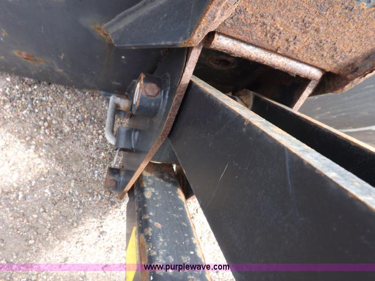 image for item H9106 1999 New Holland TV140 bi-directional MFWD tractor