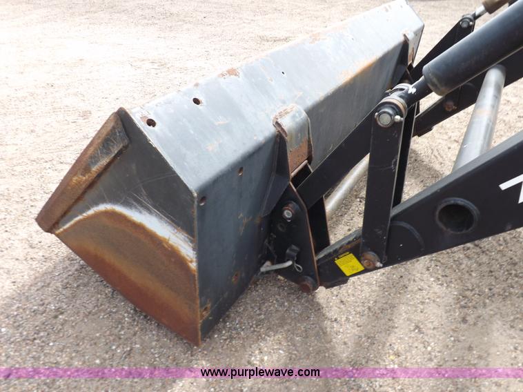 image for item H9106 1999 New Holland TV140 bi-directional MFWD tractor