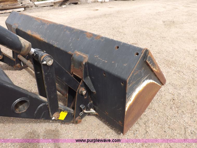 image for item H9106 1999 New Holland TV140 bi-directional MFWD tractor