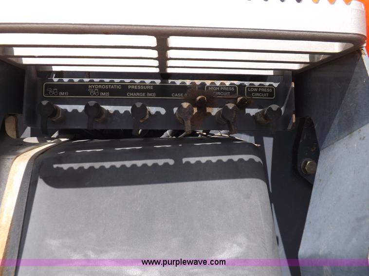 image for item H9106 1999 New Holland TV140 bi-directional MFWD tractor