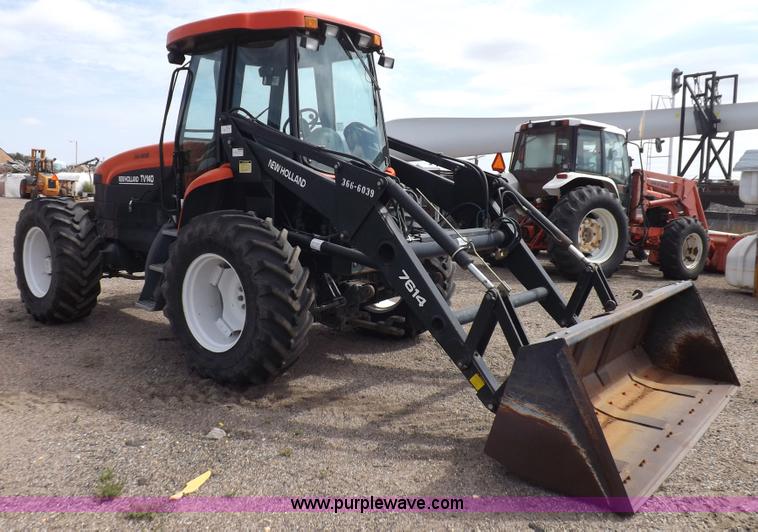 image for item H9107 1999 New Holland TV140 bi-directional MFWD tractor