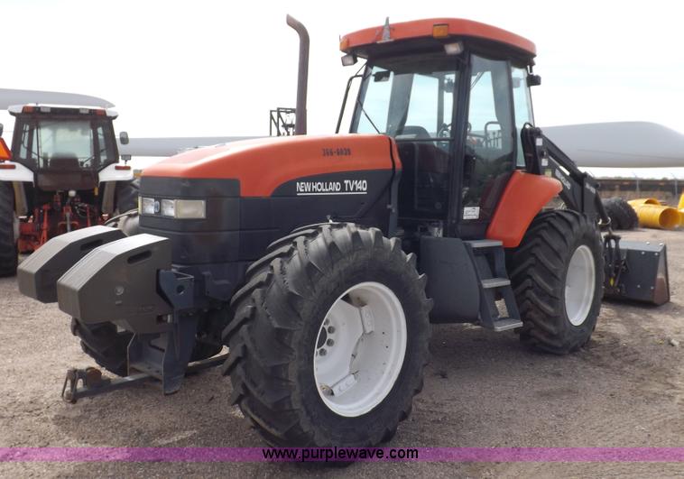 image for item H9107 1999 New Holland TV140 bi-directional MFWD tractor