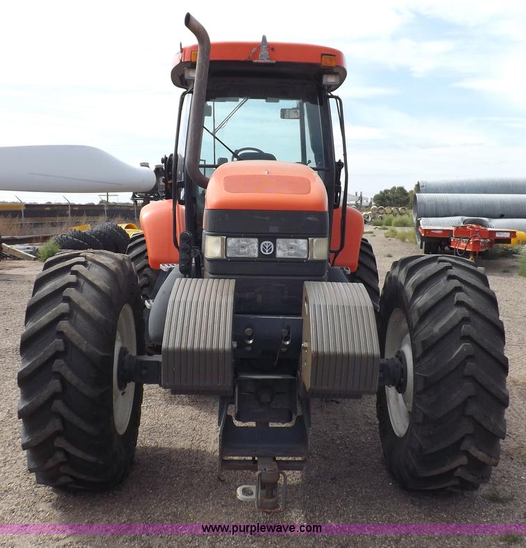 image for item H9107 1999 New Holland TV140 bi-directional MFWD tractor