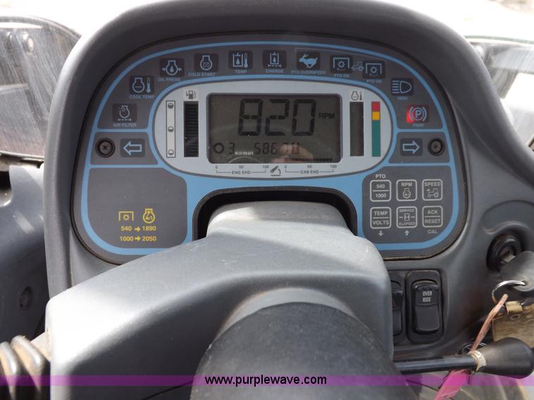 image for item H9107 1999 New Holland TV140 bi-directional MFWD tractor