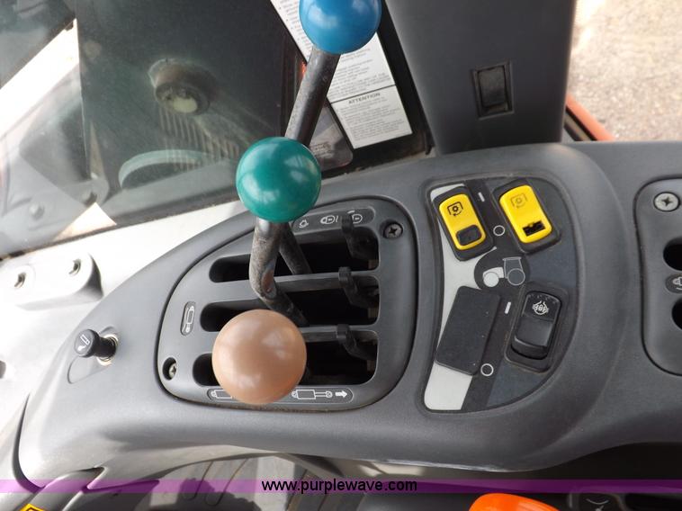 image for item H9107 1999 New Holland TV140 bi-directional MFWD tractor