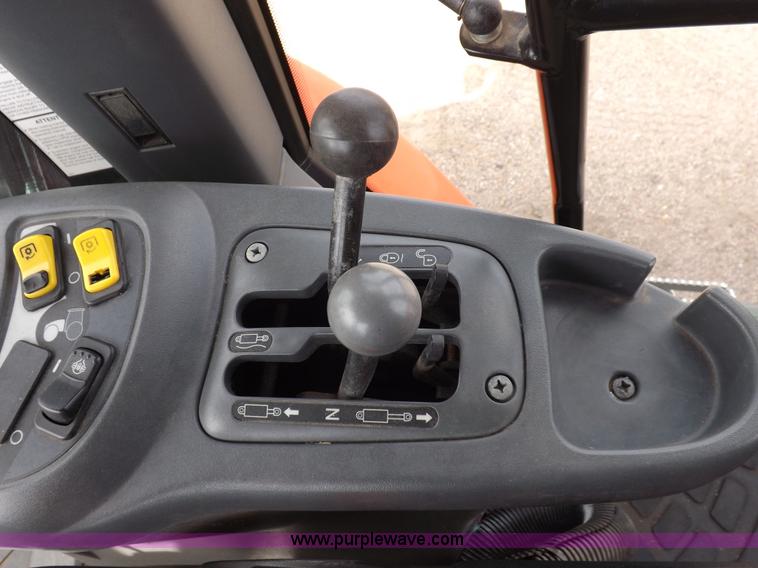 image for item H9107 1999 New Holland TV140 bi-directional MFWD tractor