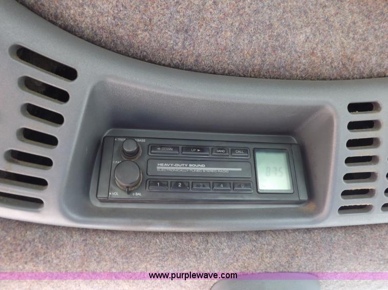 image for item H9107 1999 New Holland TV140 bi-directional MFWD tractor