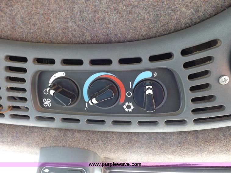 image for item H9107 1999 New Holland TV140 bi-directional MFWD tractor