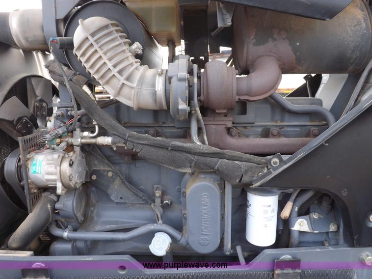 image for item H9107 1999 New Holland TV140 bi-directional MFWD tractor