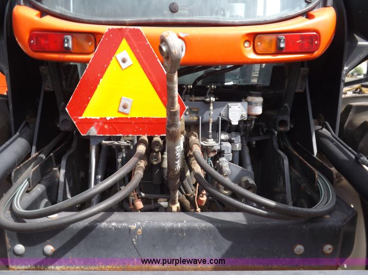 image for item H9107 1999 New Holland TV140 bi-directional MFWD tractor