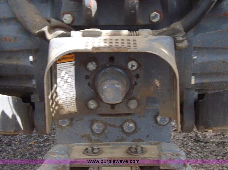 image for item H9107 1999 New Holland TV140 bi-directional MFWD tractor