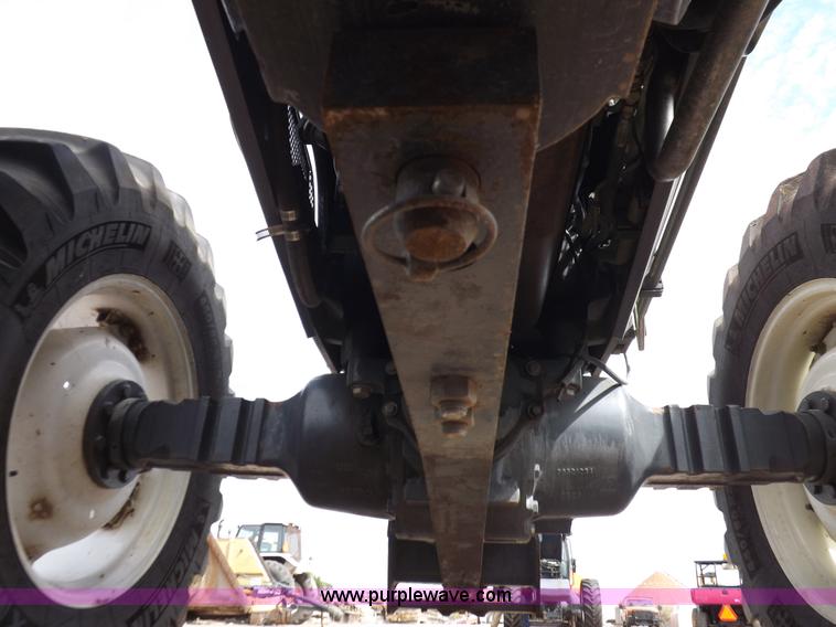 image for item H9107 1999 New Holland TV140 bi-directional MFWD tractor