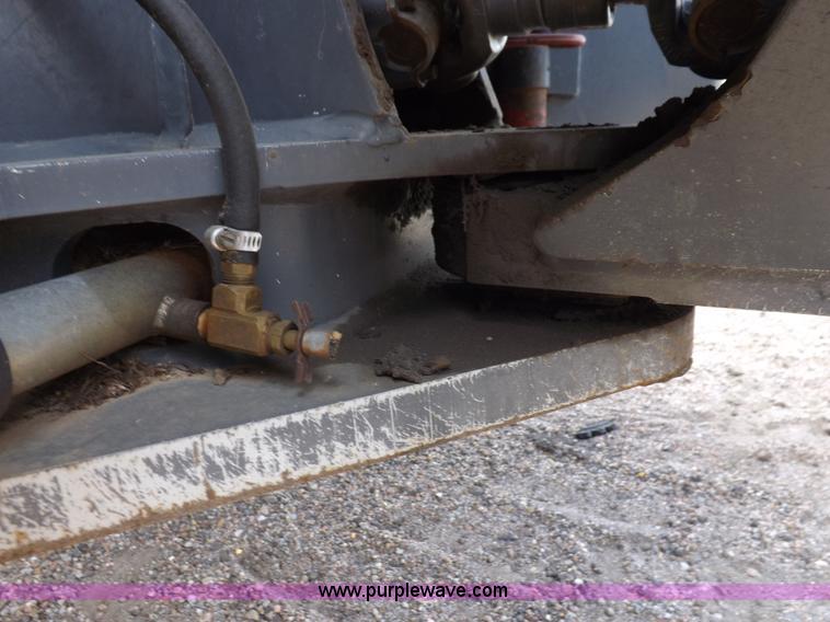 image for item H9107 1999 New Holland TV140 bi-directional MFWD tractor