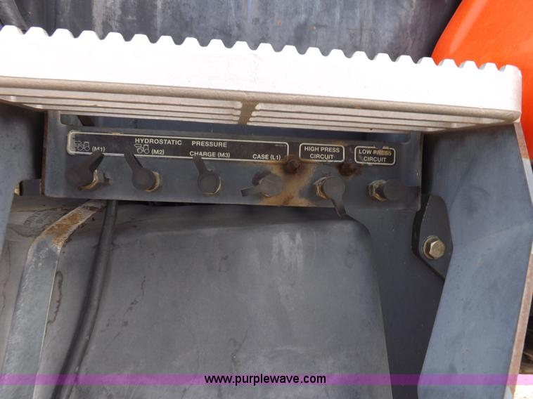 image for item H9107 1999 New Holland TV140 bi-directional MFWD tractor