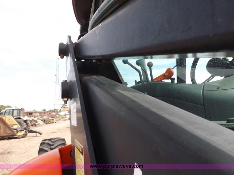 image for item H9107 1999 New Holland TV140 bi-directional MFWD tractor