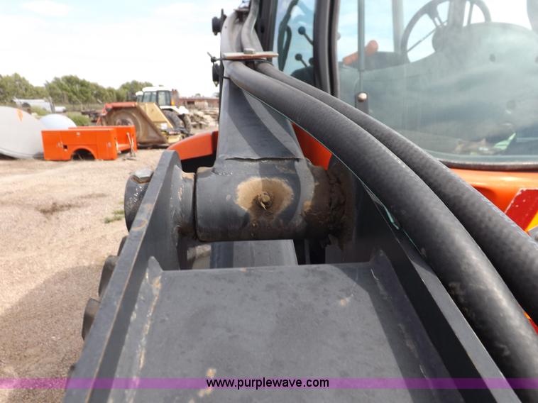 image for item H9107 1999 New Holland TV140 bi-directional MFWD tractor