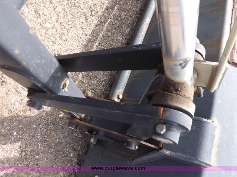 image for item H9107 1999 New Holland TV140 bi-directional MFWD tractor