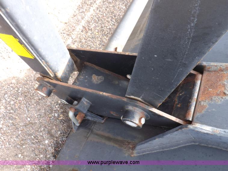 image for item H9107 1999 New Holland TV140 bi-directional MFWD tractor