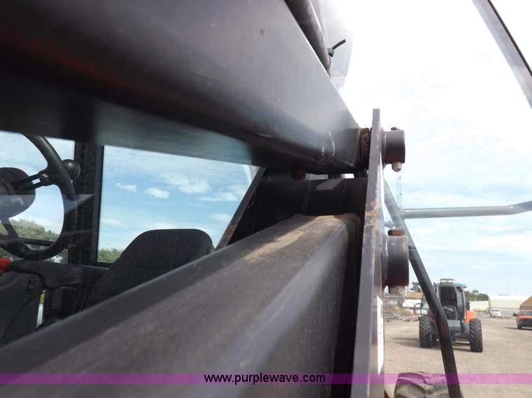 image for item H9107 1999 New Holland TV140 bi-directional MFWD tractor