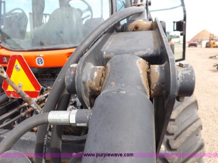 image for item H9107 1999 New Holland TV140 bi-directional MFWD tractor