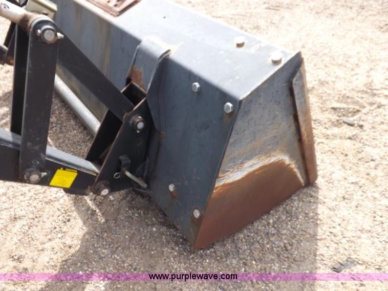 image for item H9107 1999 New Holland TV140 bi-directional MFWD tractor