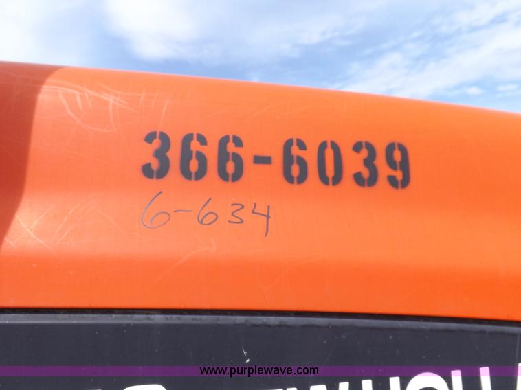 image for item H9107 1999 New Holland TV140 bi-directional MFWD tractor