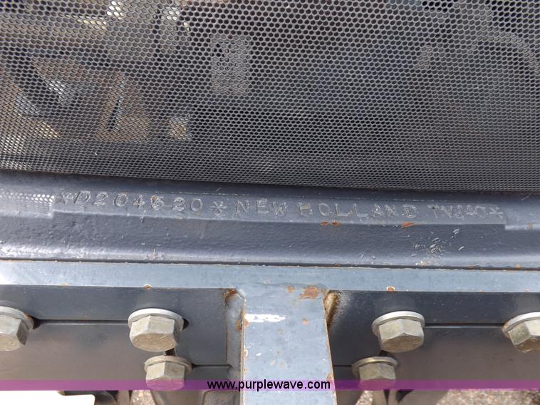 image for item H9107 1999 New Holland TV140 bi-directional MFWD tractor