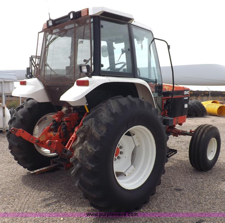 image for item H9108 1997 New Holland 6640SL tractor