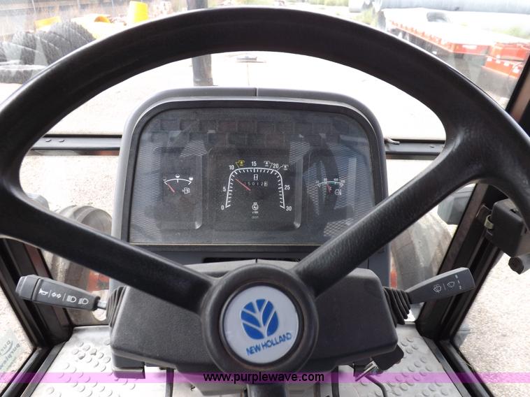 image for item H9108 1997 New Holland 6640SL tractor