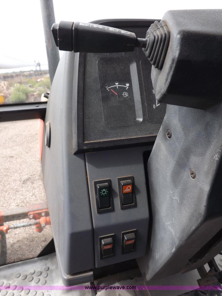 image for item H9108 1997 New Holland 6640SL tractor