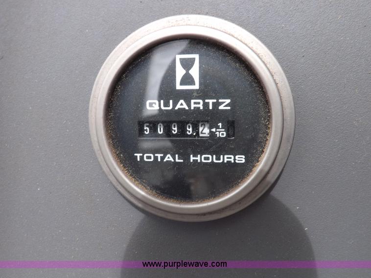 image for item H9108 1997 New Holland 6640SL tractor