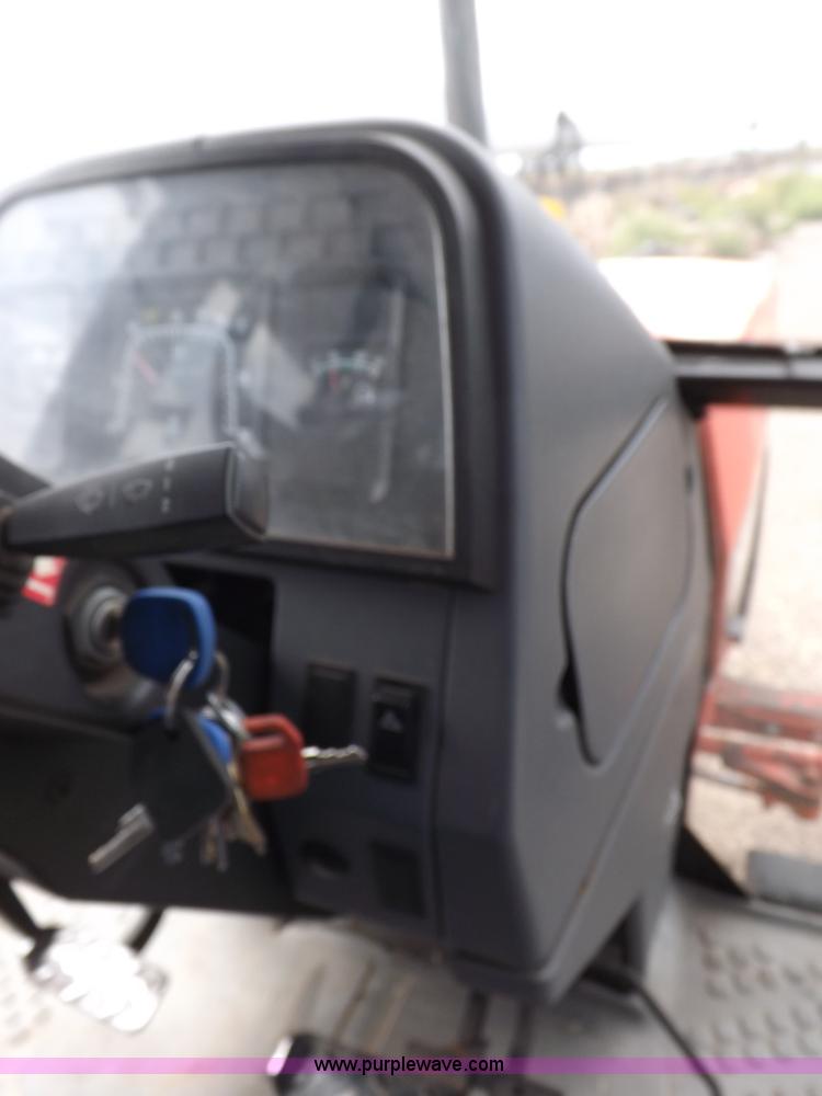 image for item H9108 1997 New Holland 6640SL tractor