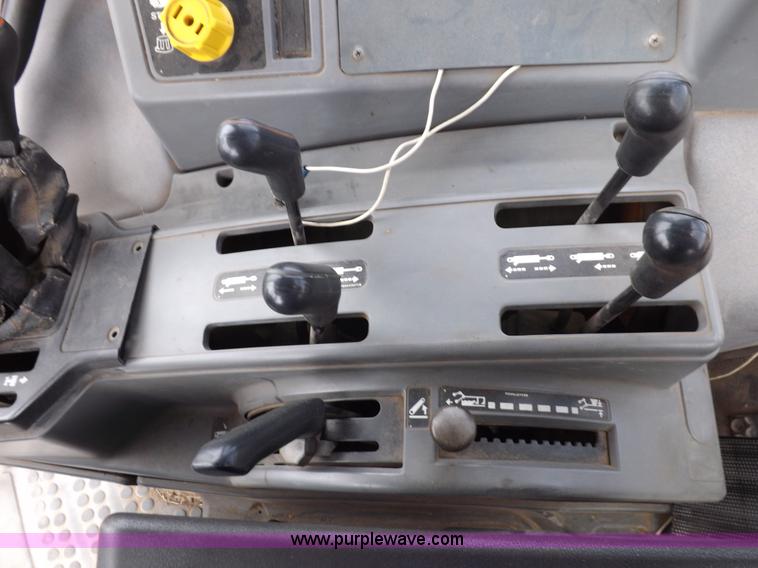 image for item H9108 1997 New Holland 6640SL tractor