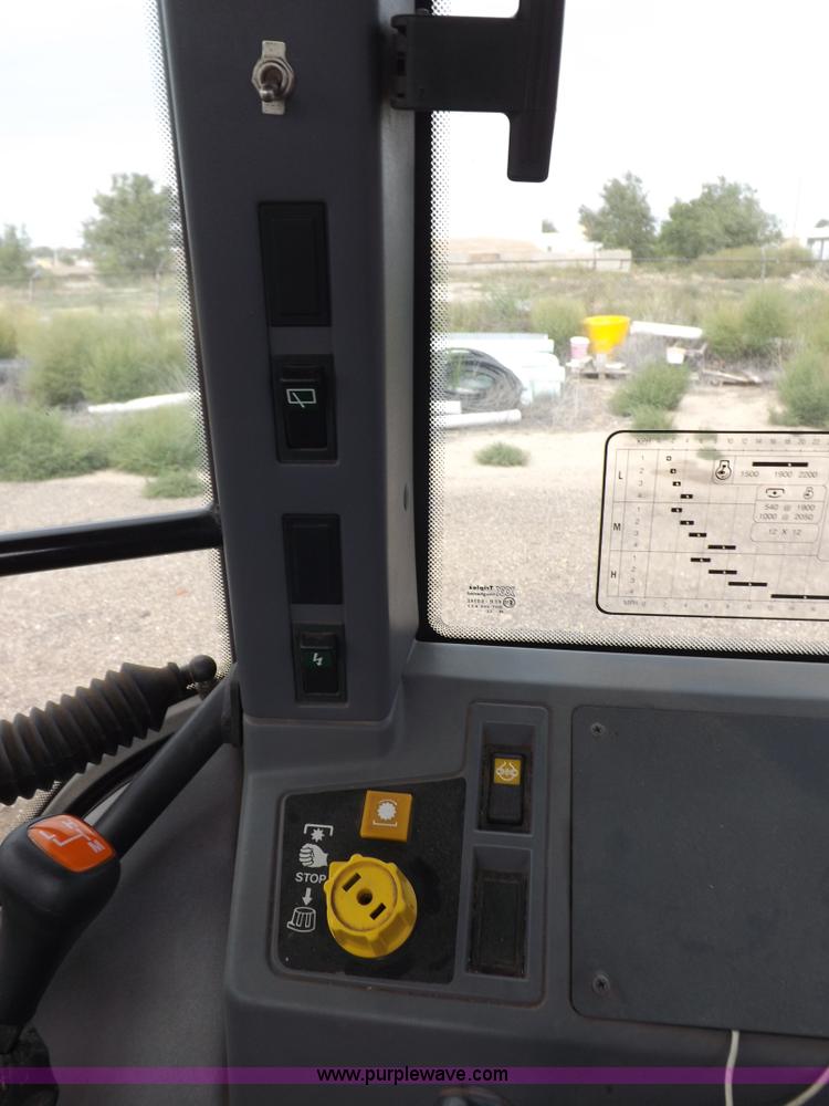 image for item H9108 1997 New Holland 6640SL tractor