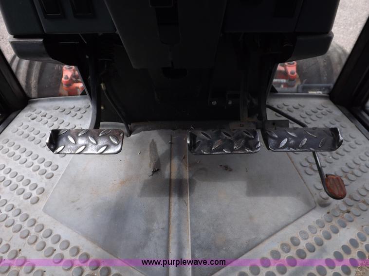 image for item H9108 1997 New Holland 6640SL tractor