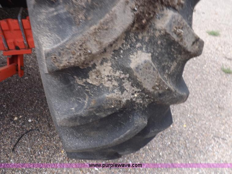 image for item H9108 1997 New Holland 6640SL tractor