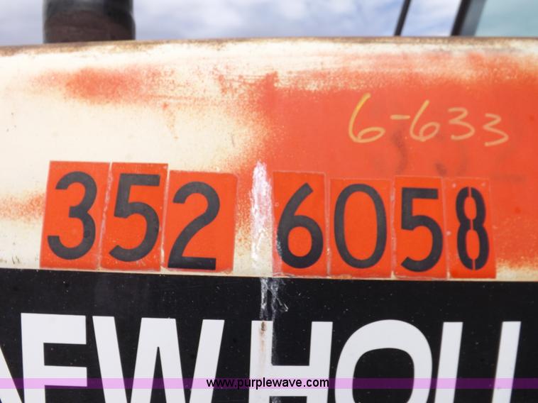 image for item H9108 1997 New Holland 6640SL tractor