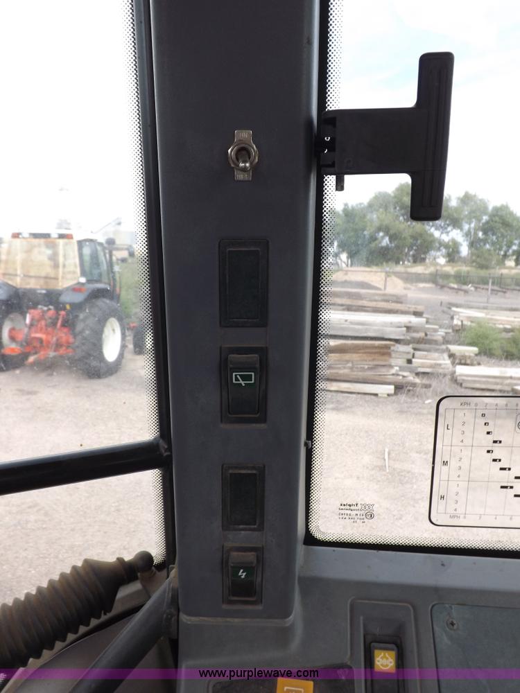 image for item H9109 1998 New Holland 7740SL MFWD tractor