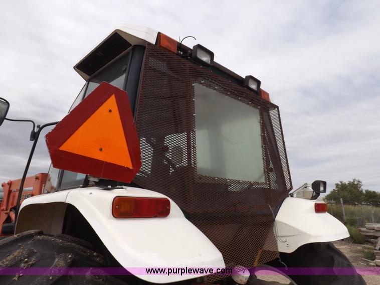 image for item H9109 1998 New Holland 7740SL MFWD tractor