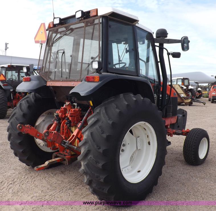 image for item H9110 2000 New Holland TS100 tractor