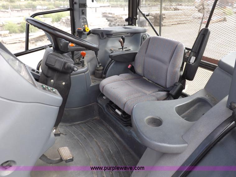 image for item H9110 2000 New Holland TS100 tractor