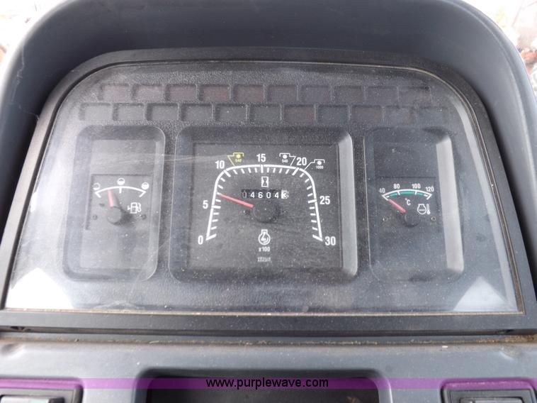 image for item H9110 2000 New Holland TS100 tractor