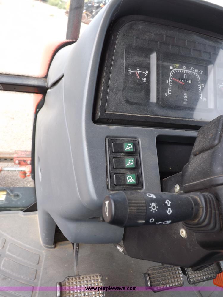 image for item H9110 2000 New Holland TS100 tractor