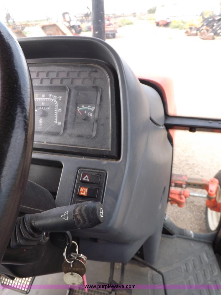 image for item H9110 2000 New Holland TS100 tractor