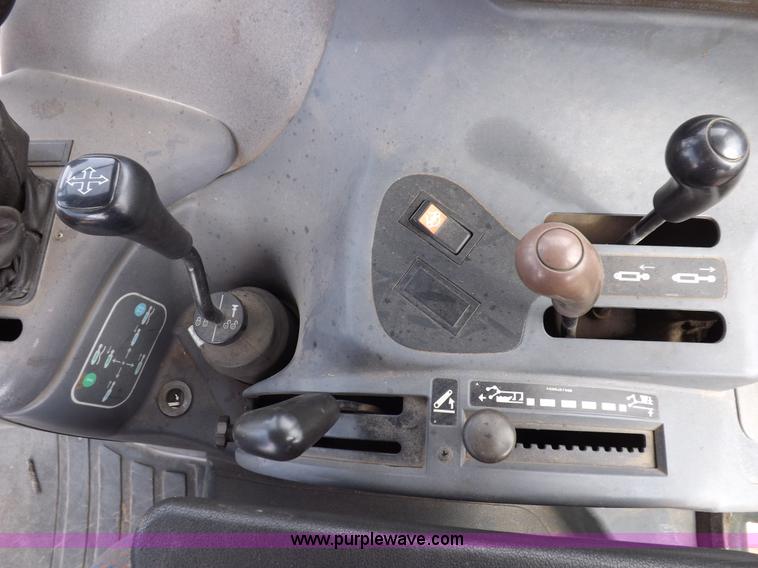 image for item H9110 2000 New Holland TS100 tractor