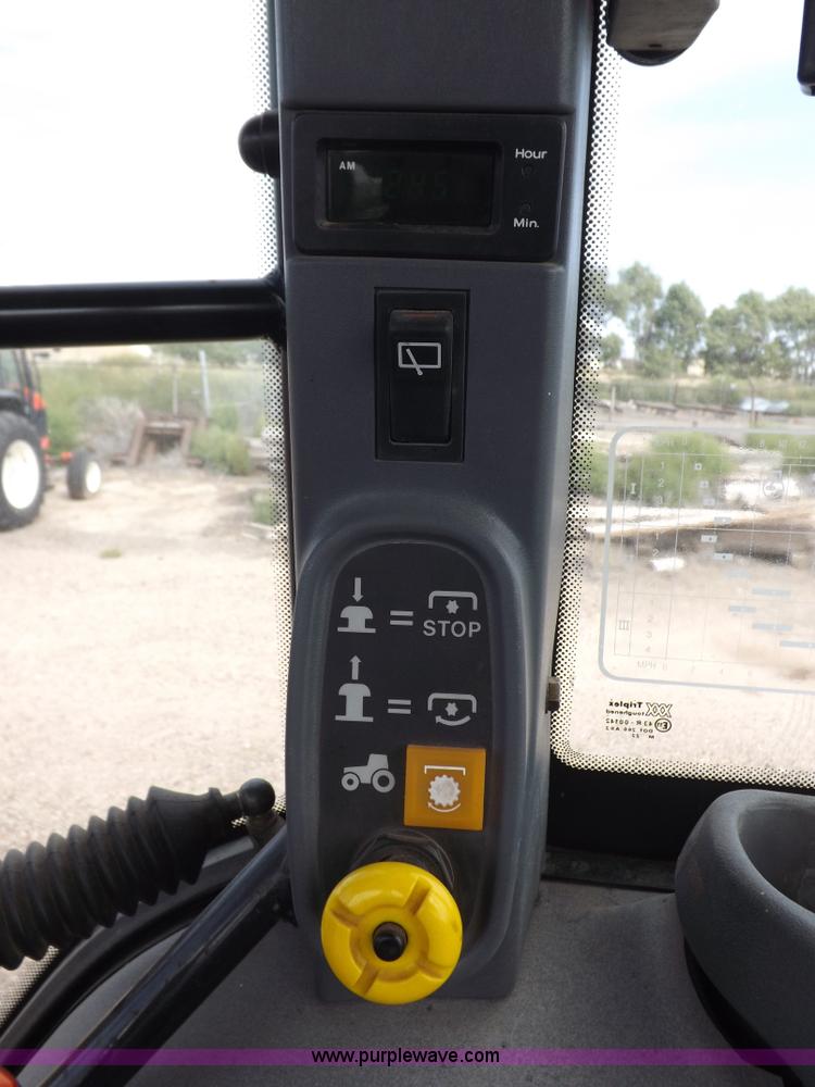 image for item H9110 2000 New Holland TS100 tractor