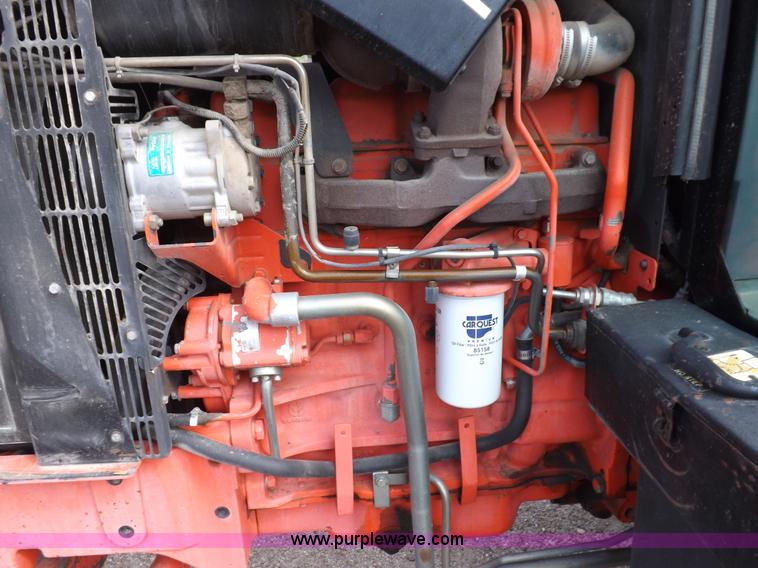 image for item H9110 2000 New Holland TS100 tractor