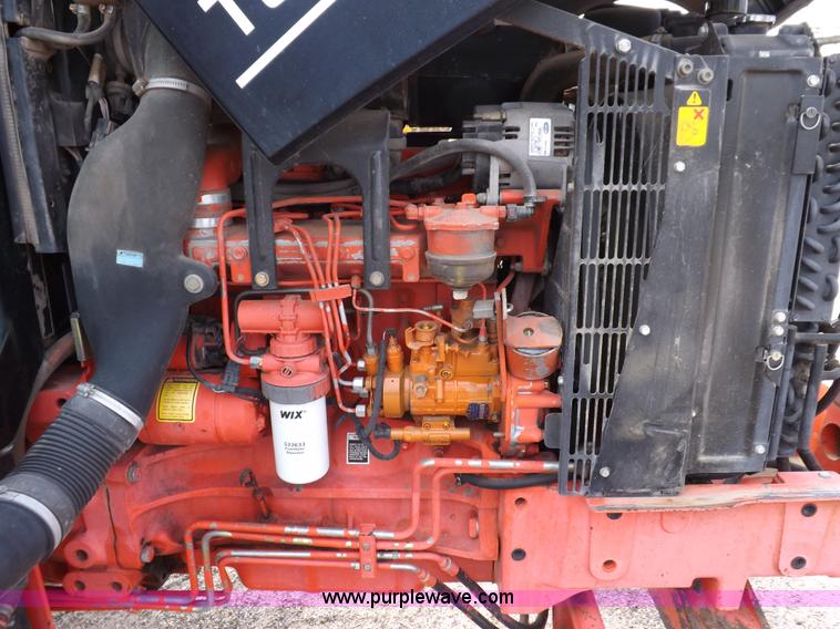 image for item H9110 2000 New Holland TS100 tractor