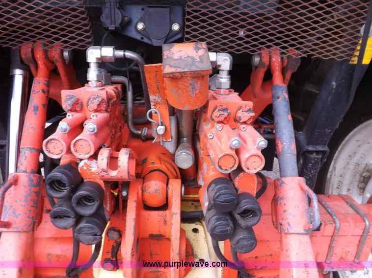 image for item H9110 2000 New Holland TS100 tractor