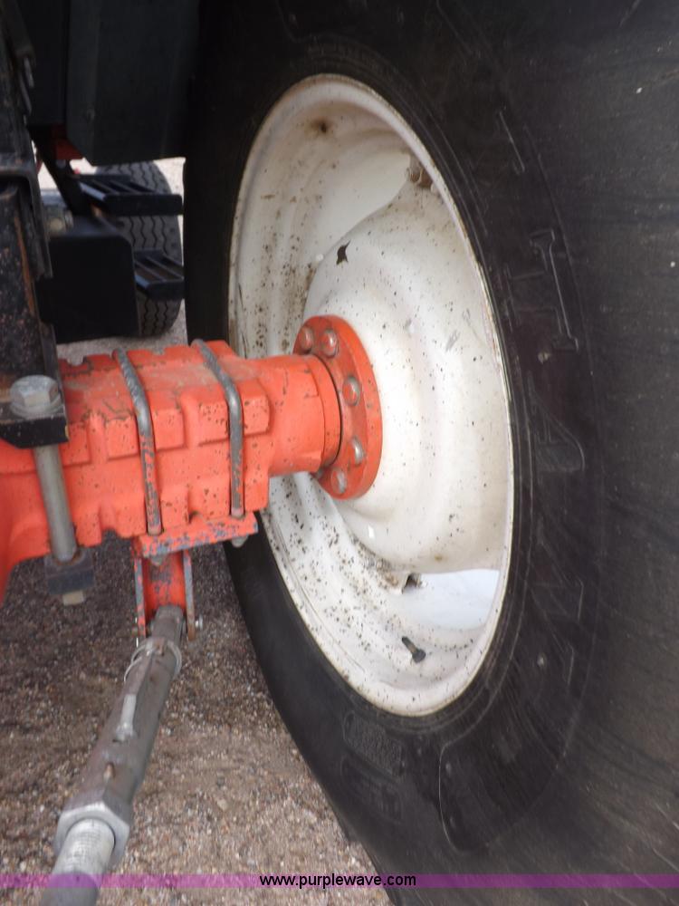 image for item H9110 2000 New Holland TS100 tractor